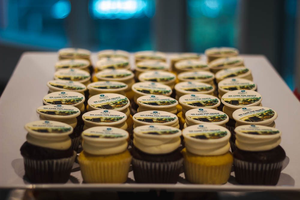 Rows of cupcakes on a tray