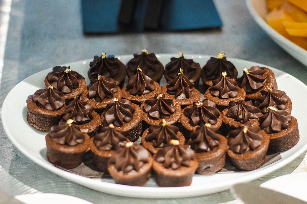 A plate of chocolate tarts